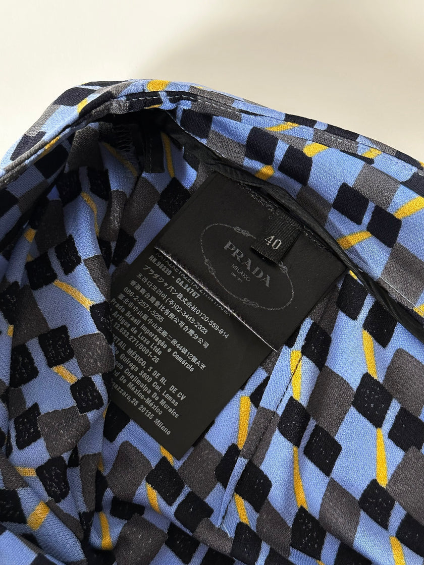 Pantaloni Prada P/E 2017 con stampa geometrica e piume di struzzo nere