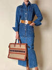 Giacca Christian Lacroix in denim modello sciancrato con lavorazione a nervature
