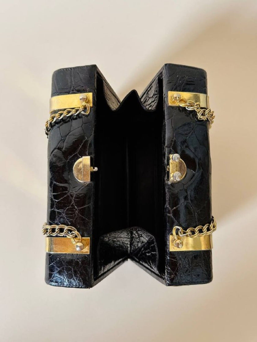 Borsa a bauletto in pelle stampa coccodrillo color testa di moro con manici a catena