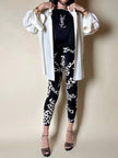 T-shirt vintage Yves Saint Laurent in cotone nero con logo YSL in lamé argento e strass