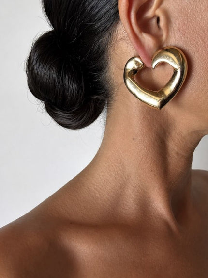 Orecchini a clip vintage Yves Saint Laurent a forma di cuore in metallo dorato