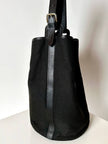 Secchiello vintage Yves Saint Laurent in tessuto nero millerighe con riporti in pelle