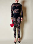 Jumpsuit con staffe in pizzo nero “La Perla”