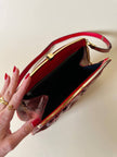 Pochette in whips rossa con tracolla regolabile