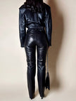 Giacca biker vintage in pelle nera con borchie dorate testa di medusa