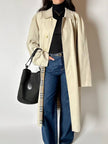 Secchiello vintage Yves Saint Laurent in tessuto nero millerighe con riporti in pelle