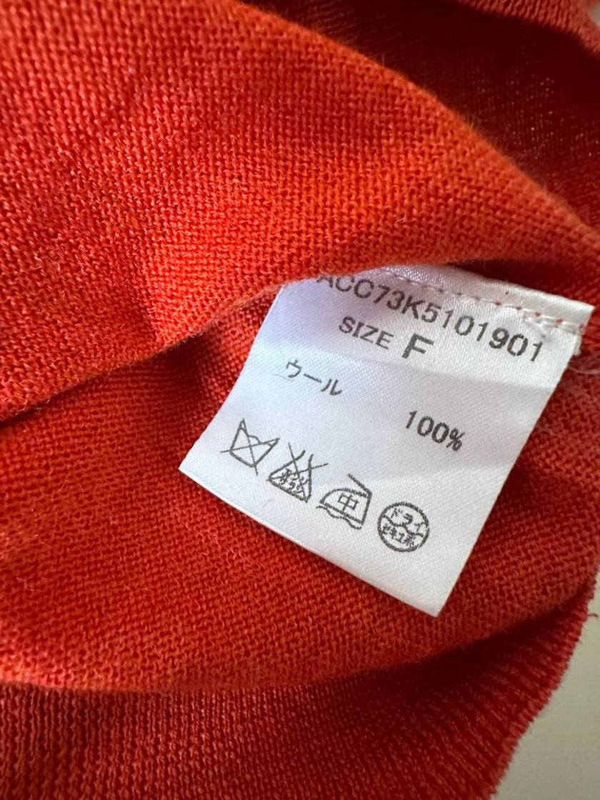 Dolcevita vintage in lana arancione tenné con motivo centrale a coste