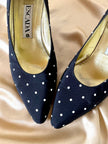 Décolleté in tessuto nero a pois bianchi “Escada”