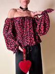 Blusa in seta nera con bocche e cuori rossi “Yves Saint Laurent”