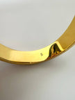 Bracciale vintage Fendi in metallo oro rifinito con smaltato grigio e rosso