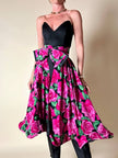 Gonna a ruota in seta fantasia floreale fucsia con maxi fiocco