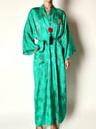 Collana vintage in stile orientale con ciondolo rotondo in cinabro rosso e nappa couture