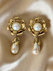 Clip dorate a forma di fiore con perle pendenti “Yves Saint Laurent”