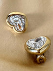 Clip dorate a forma di cuore con strass centrale