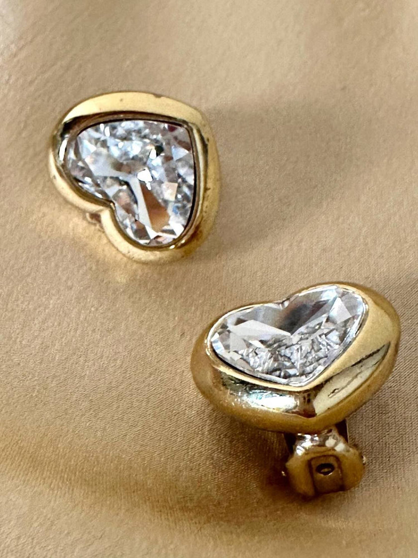 Clip dorate a forma di cuore con strass centrale