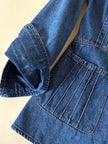 Giacca Christian Lacroix in denim modello sciancrato con lavorazione a nervature