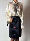 Gonna vintage Yves Saint Laurent Variation in raso nero con bottoni gioiello