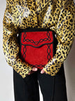 Borsa vintage Yves Saint Laurent in camoscio rosso con passamaneria nera