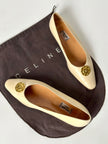Ballerine vintage Celine Paris in pelle avorio con medaglioni dorati logati