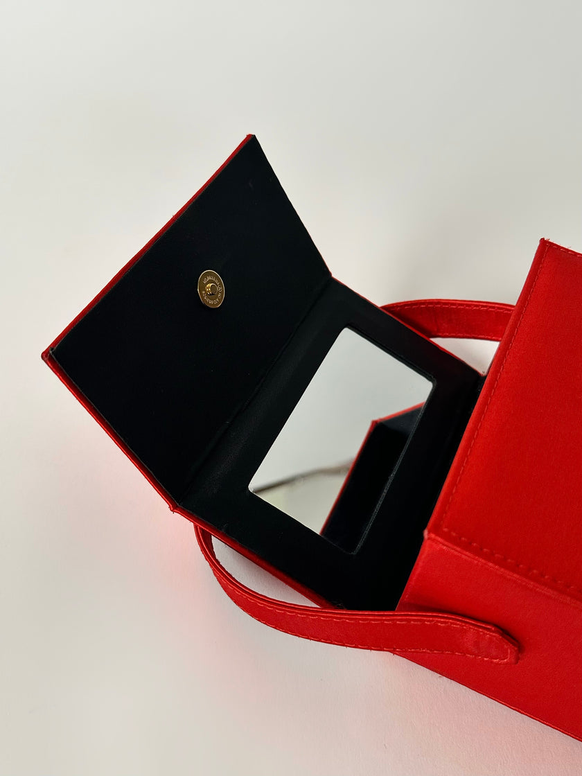Mini bag vintage Versace Profumi in raso rosso con borchia medusa