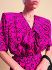 Abito bouganville con pattern nero a pois