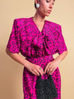 Abito bouganville con pattern nero a pois