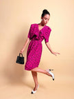 Abito bouganville con pattern nero a pois