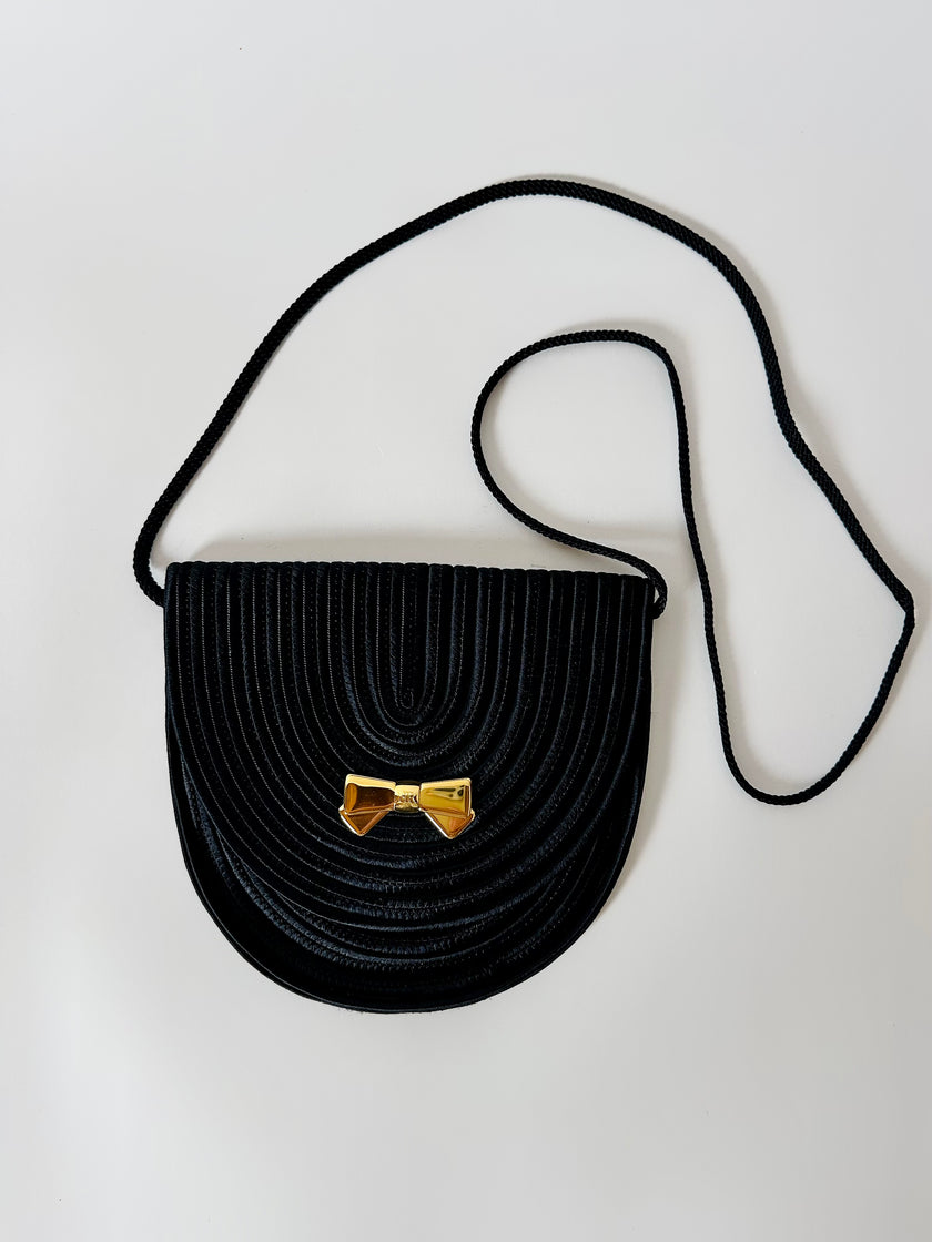 Borsa vintage Nina Ricci Paris in passamaneria nera con fiocco dorato