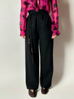 Pantaloni vintage Yves Saint Laurent Variation in lana nera a gamba ampia con tasche applicate
