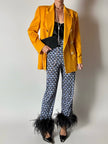 Pantaloni Prada P/E 2017 con stampa geometrica e piume di struzzo nere