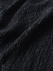 Blusa vintage Valentino Miss V in seta nera goffrata
