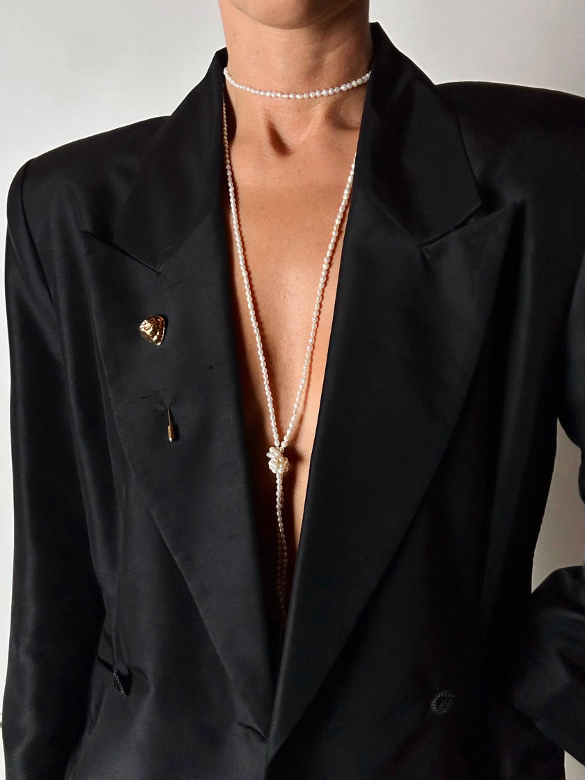 Spillone vintage Yves Saint Laurent dorato con pepita martellata