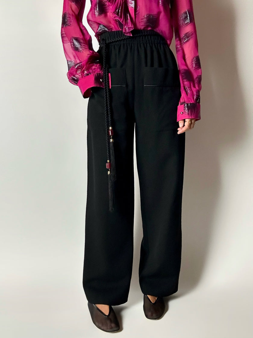 Pantaloni vintage Yves Saint Laurent Variation in lana nera a gamba ampia con tasche applicate