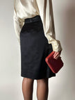 Gonna vintage Yves Saint Laurent Variation in raso nero con bottoni gioiello