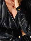 Jumpsuit vintage Yves Saint Laurent Rive Gauche nera con righe in lamé oro