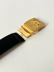 Cintura vintage Yves Saint Laurent in camoscio nero con maxi fibbia oro logata YSL