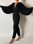 Jumpsuit vintage Emilio Pucci nera con maniche a pipistrello e nappa couture