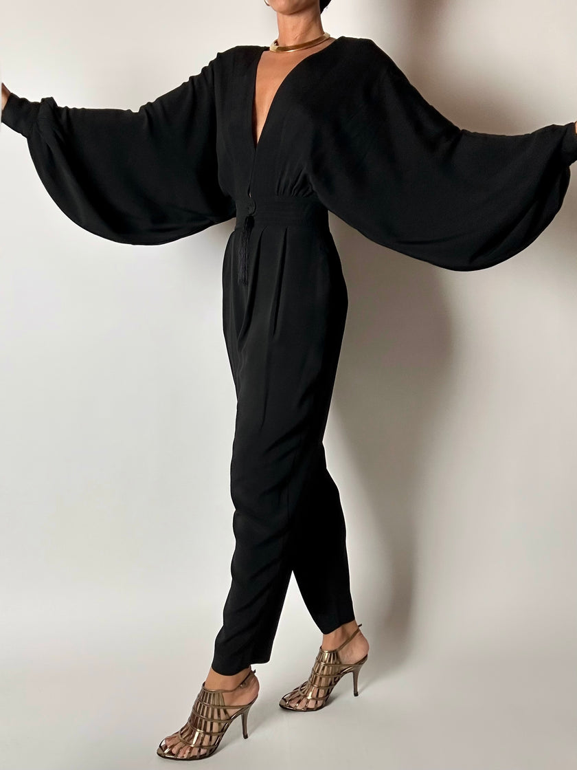 Jumpsuit vintage Emilio Pucci nera con maniche a pipistrello e nappa couture