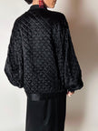 Bomber vintage Valentino Boutique in raso di seta nera trapuntato con fodera rossa