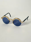 Occhiali da sole vintage Oliver Valentino con montatura gioiello dorata e lenti blu