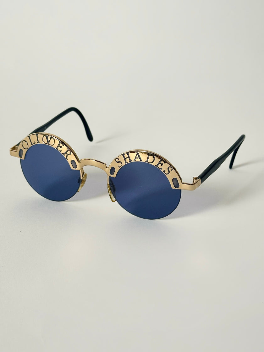 Occhiali da sole vintage Oliver Valentino con montatura gioiello dorata e lenti blu