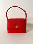 Mini bag vintage Versace Profumi in raso rosso con borchia medusa