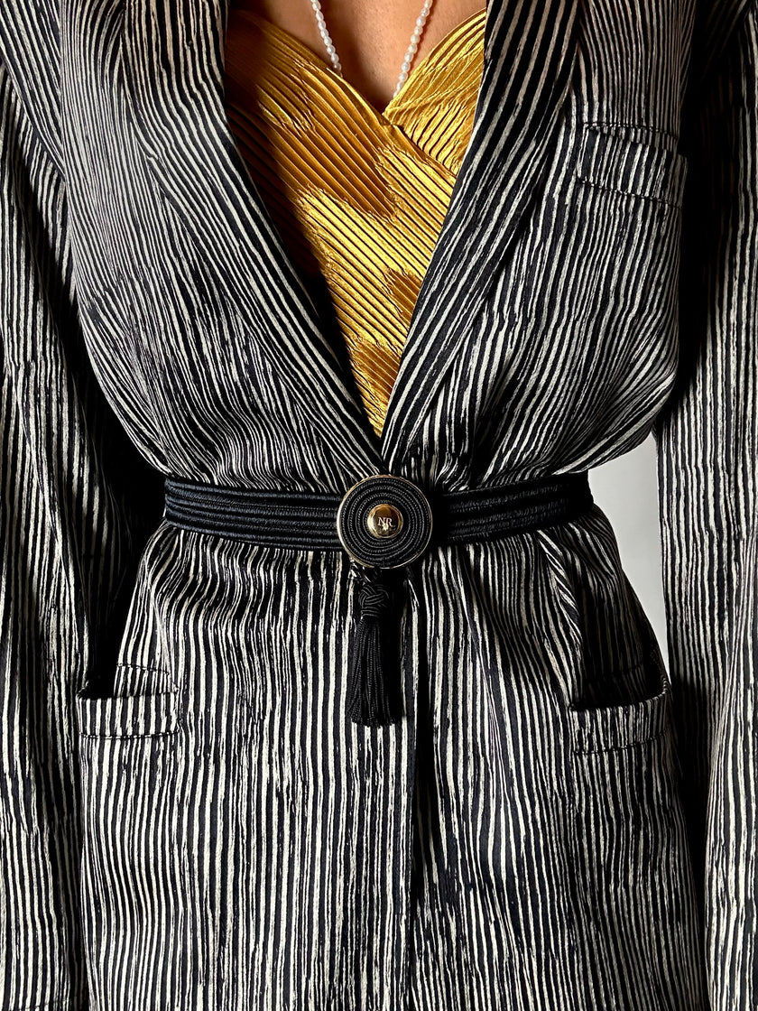 Cintura vintage Nina Ricci Paris in passamaneria elastica nera con fibbia gioiello e nappa couture