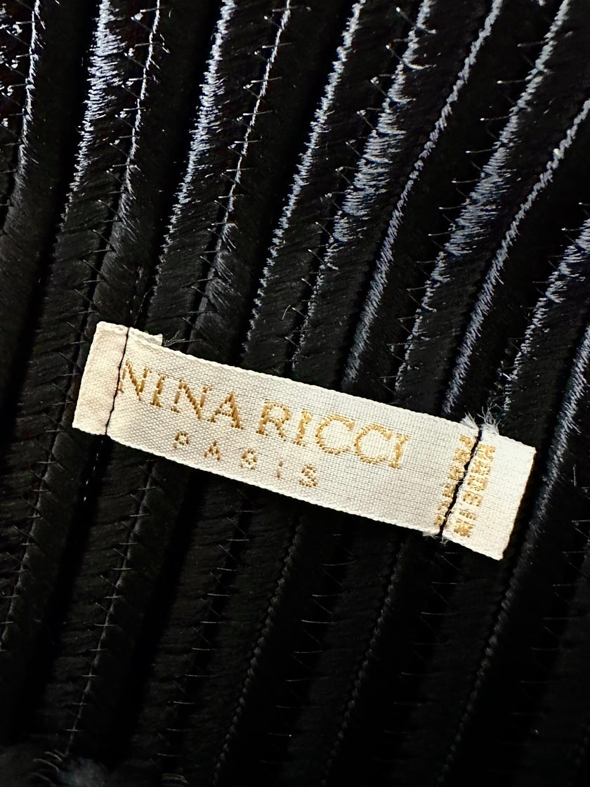 Borsa vintage Nina Ricci Paris in passamaneria nera con fiocco dorato