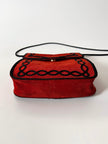 Borsa vintage Yves Saint Laurent in camoscio rosso con passamaneria nera