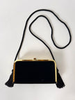 Borsa vintage in velluto nero con struttura dorata e nappe laterali