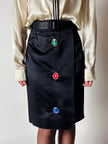 Gonna vintage Yves Saint Laurent Variation in raso nero con bottoni gioiello