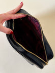 Beauty case in ecopelle nera “Valentino Garavani”