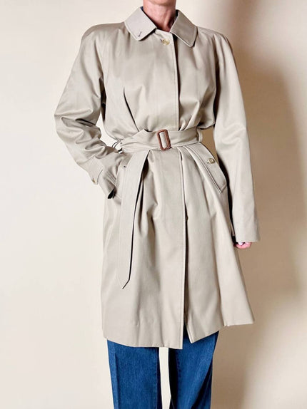 Trench vintage Burberry’s in gabardine beige quill con fcintura in coordinato e fodera Check
