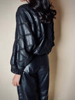 Blusa vintage in pelle nera patchwork con lavorazione crochet e maniche a pipistrello